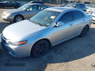 2004 Acura TSX w/Navigation with VIN JH4CL96954C035277, listed as a IAAI auction lot 41766775 with 999,999 mi miles. Bid and sale history available at carsss.com. Image 2.