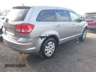 2015 Dodge Journey SE z VIN 3C4PDCAB3FT641675, wystawiony jako IAAI lot #41898611 z przebiegiem 218 121 mil mil oraz . Historia ofert i sprzedaży dostępna na DreamBid. Obrazek 4.