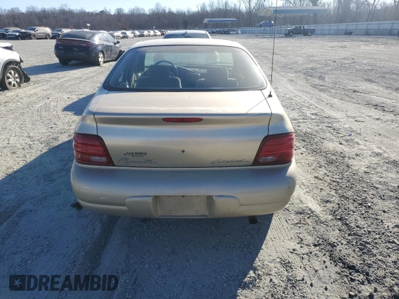 1999 Plymouth Breeze z VIN 1P3EJ46X0XN502387, wystawiony jako Copart lot #47023985 z przebiegiem 119 469 mil mil oraz Szkoda całkowita • Salvage title. Historia ofert i sprzedaży dostępna na DreamBid. Obrazek 6.