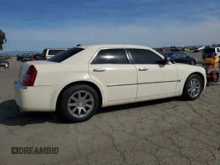 2005 Chrysler 300 with VIN 2C3AA63H25H144615, listed as a Copart auction lot 48435435 with 154,319 mi miles and Clean Title. Bid and sale history available at carsss.com. Image 3.