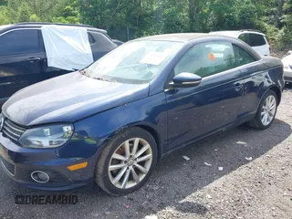 2012 Volkswagen Eos Komfort with VIN WVWBW7AH5CV005559, listed as a IAAI auction lot 42206644 with 160,843 mi miles and . Bid and sale history available at DreamBid. Image 2.