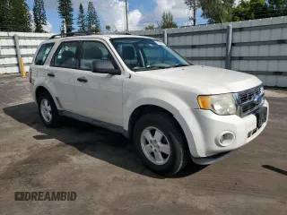 2011 Ford Escape XLS with VIN 1FMCU9C71BKC08406, listed as a Copart auction lot 61359975 with 182,954 mi miles and Salvage title. Bid and sale history available at DreamBid. Image 4.