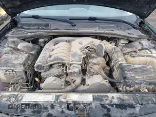 2010 Dodge Charger SXT with VIN 2B3CA3CV7AH144369, listed as a IAAI auction lot 41911678 with 235,218 mi miles. Bid and sale history available at carsss.com. Image 10.