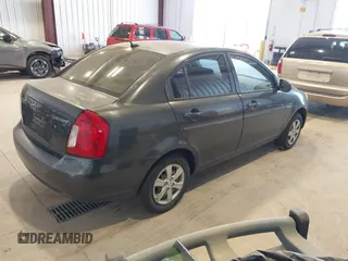 2010 Hyundai Accent GLS z VIN KMHCN4AC0AU423407, wystawiony jako IAAI lot #42428621 z przebiegiem 132 654 mil mil oraz . Historia ofert i sprzedaży dostępna na DreamBid. Obrazek 4.