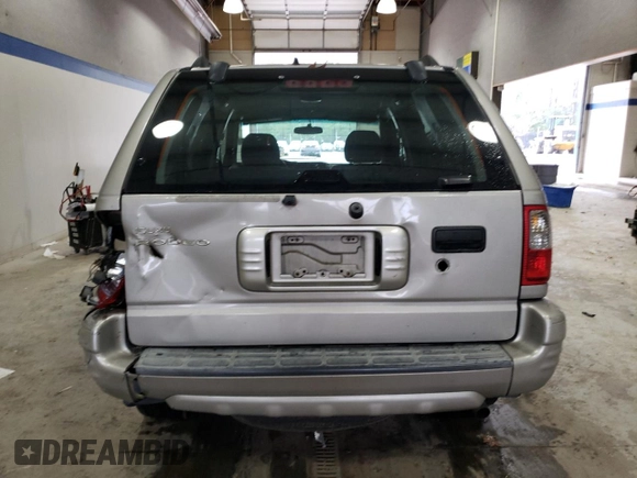 2004 Isuzu Rodeo S z VIN 4S2CK58W144306785, wystawiony jako Copart lot #85124684 z przebiegiem 296 433 mil mil oraz Szkody całkowita. Historia ofert i sprzedaży dostępna na DreamBid. Obrazek 6.