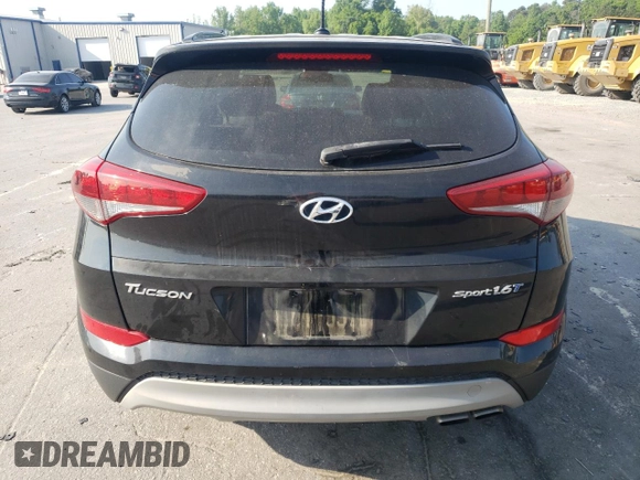 2017 Hyundai Tucson Sport z VIN KM8J33A21HU550398, wystawiony jako Copart lot #55043145 z przebiegiem 92 677 mil mil oraz Szkoda całkowita • Salvage title. Historia ofert i sprzedaży dostępna na DreamBid. Obrazek 6.
