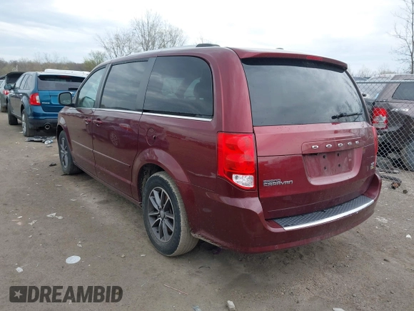 2017 Dodge Grand Caravan SXT with VIN 2C4RDGCG2HR713769, listed as a IAAI auction lot 42074875 with 184,241 mi miles and . Bid and sale history available at DreamBid. Image 3.