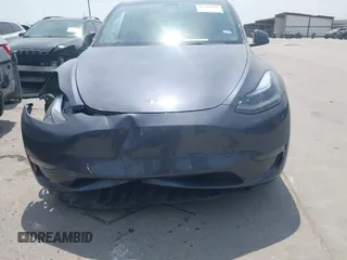2023 Tesla Model Y Long Range z VIN 7SAYGDEE6PA169168, wystawiony jako IAAI lot #42050428 z przebiegiem 26 731 mil mil oraz . Historia ofert i sprzedaży dostępna na DreamBid. Obrazek 12.