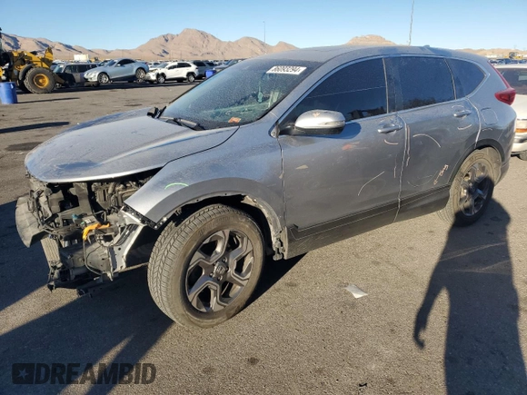 2019 Honda CR-V EX-L with VIN 5J6RW1H84KA011418, listed as a Copart auction lot 86093294 with 96,893 mi miles and Salvage Title. Bid and sale history available at carsss.com. Image 1.