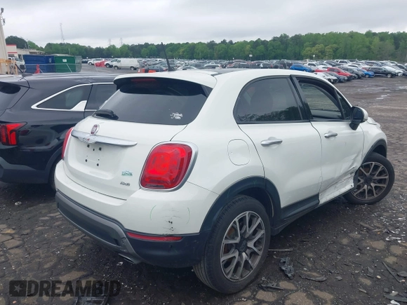 2017 FIAT 500X Trekking with VIN ZFBCFYCB3HP538169, listed as a IAAI auction lot 41975262 with 48,526 mi miles and . Bid and sale history available at DreamBid. Image 4.