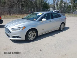2013 Ford Fusion SE Hybrid with VIN 3FA6P0LU7DR196888, listed as a IAAI auction lot 42156366 with 393,358 mi miles. Bid and sale history available at carsss.com. Image 2.