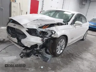 2019 Ford Fusion Hybrid SEL with VIN 3FA6P0MU8KR272811, listed as a IAAI auction lot 41705282 with 56,565 mi miles. Bid and sale history available at carsss.com. Image 17.