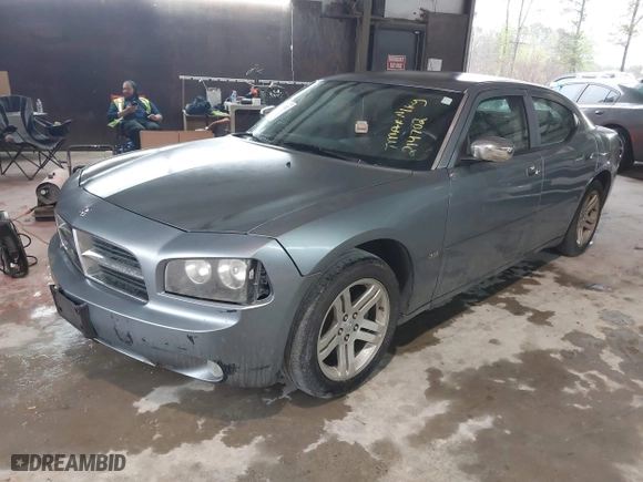 2006 Dodge Charger with VIN 2B3KA43GX6H214702, listed as a IAAI auction lot 41883787 with 187,302 mi miles. Bid and sale history available at carsss.com. Image 2.