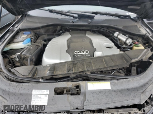 2013 Audi Q7 Prestige with VIN WA1WMAFE3DD015379, listed as a Copart auction lot 77213144 with 111,033 mi miles and Salvage title. Bid and sale history available at DreamBid. Image 12.