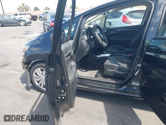 2015 Honda Fit LX z VIN 3HGGK5H52FM765921, wystawiony jako IAAI lot #42135740 z przebiegiem 82 647 mil mil oraz . Historia ofert i sprzedaży dostępna na DreamBid. Obrazek 5.