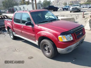 2002 Ford Explorer Sport Trac Value z VIN 1FMZU67EX2UC75933, wystawiony jako IAAI lot #42181837 z przebiegiem 223 979 mil mil oraz . Historia ofert i sprzedaży dostępna na DreamBid. Obrazek 1.