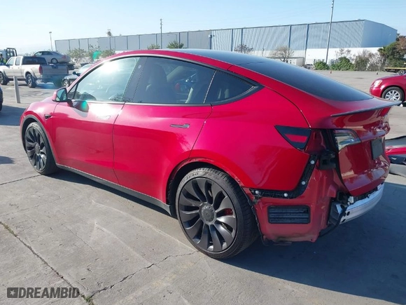 2021 Tesla Model Y Performance with VIN 5YJYGDEF5MF211592, listed as a IAAI auction lot 41766033 with 59,694 mi miles. Bid and sale history available at carsss.com. Image 3.