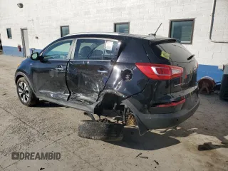 2011 Kia Sportage SX with VIN KNDPCCA66B7150506, listed as a Copart auction lot 50261715 with 199,282 mi miles and Salvage title. Bid and sale history available at DreamBid. Image 2.