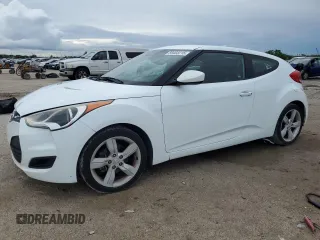 2014 Hyundai Veloster z VIN KMHTC6AD1EU198169, wystawiony jako Copart lot #59403215 z przebiegiem 133 445 mil mil oraz Szkoda całkowita • Salvage title. Historia ofert i sprzedaży dostępna na DreamBid. Obrazek 1.