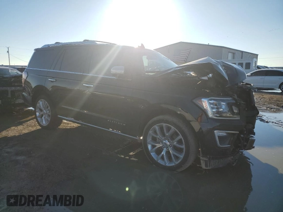 2018 Ford Expedition Platinum with VIN 1FMJU1MT5JEA67244, listed as a Copart auction lot 88587445 with 71,520 mi miles and Salvage Title. Bid and sale history available at carsss.com. Image 4.