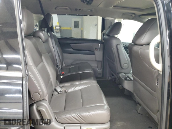 2015 Honda Odyssey Touring Elite with VIN 5FNRL5H99FB005576, listed as a Copart auction lot 58963215 with 167,967 mi miles and Salvage title. Bid and sale history available at DreamBid. Image 11.