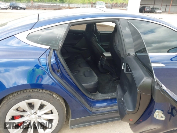 2016 Tesla Model S 90D with VIN 5YJSA1E4XGF168165, listed as a IAAI auction lot 42220139 with Not provided miles and . Bid and sale history available at DreamBid. Image 7.