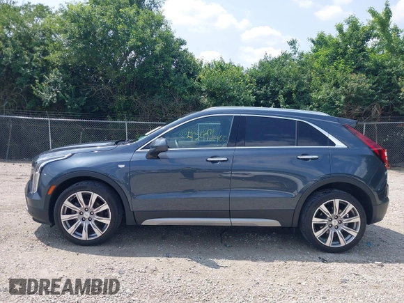 2019 Cadillac XT4 FWD Premium Luxury z VIN 1GYFZCR43KF143980, wystawiony jako IAAI lot #42472400 z przebiegiem 36 496 mil mil oraz . Historia ofert i sprzedaży dostępna na DreamBid. Obrazek 14.