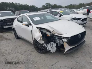 2021 Mazda 3 Premium with VIN JM1BPAML6M1304741, listed as a IAAI auction lot 41192648 with 45,451 mi miles and . Bid and sale history available at DreamBid. Image 1.
