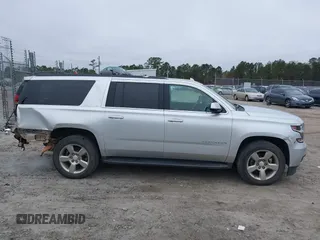 2018 Chevrolet Suburban LT z VIN 1GNSCHKC1JR394991, wystawiony jako IAAI lot #41192222 z przebiegiem 90 313 mil mil oraz . Historia ofert i sprzedaży dostępna na DreamBid. Obrazek 14.