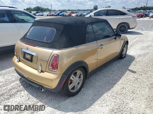 2005 MINI Convertible with VIN WMWRF334X5TG11889, listed as a Copart auction lot 55567995 with 169,717 mi miles and Salvage title. Bid and sale history available at DreamBid. Image 3.