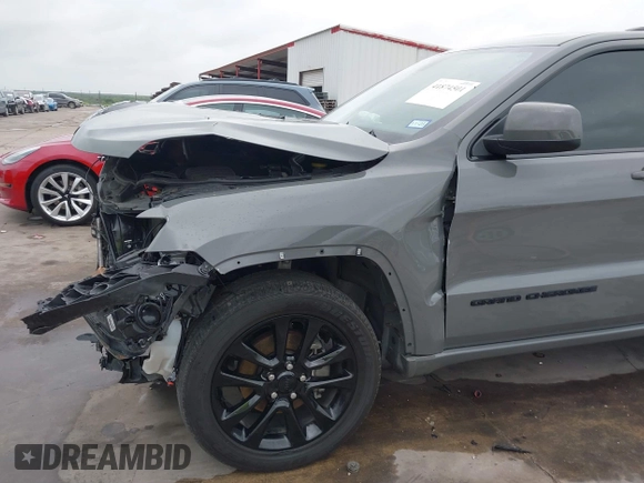 2020 Jeep Grand Cherokee Altitude with VIN 1C4RJFAG1LC176593, listed as a IAAI auction lot 41874501 with 40,234 mi miles and . Bid and sale history available at DreamBid. Image 19.