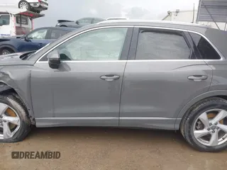 2020 Audi Q3 Premium z VIN WA1AECF30L1052472, wystawiony jako IAAI lot #41886809 z przebiegiem 101 600 mil mil oraz . Historia ofert i sprzedaży dostępna na DreamBid. Obrazek 14.