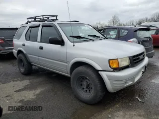 1998 Isuzu Rodeo S z VIN 4S2CK58W1W4327395, wystawiony jako Copart lot #44400715 z przebiegiem 193 659 mil mil oraz Szkoda całkowita • Salvage title. Historia ofert i sprzedaży dostępna na DreamBid. Obrazek 4.