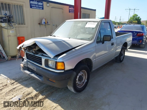 1990 Isuzu Pickup S z VIN JAACL11L6L7206171, wystawiony jako IAAI lot #42214364 z przebiegiem 75 057 mil mil oraz . Historia ofert i sprzedaży dostępna na DreamBid. Obrazek 17.
