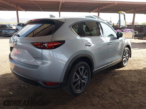 2017 Mazda CX-5 Grand Touring with VIN JM3KFADL3H0121772, listed as a IAAI auction lot 41935183 with 48,869 mi miles and . Bid and sale history available at carsss.com. Image 4.