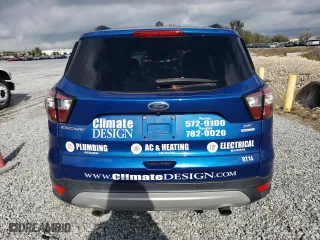 2018 Ford Escape SE with VIN 1FMCU0GD3JUC67441, listed as a Copart auction lot 86274134 with 101,667 mi miles and Salvage Title. Bid and sale history available at carsss.com. Image 6.