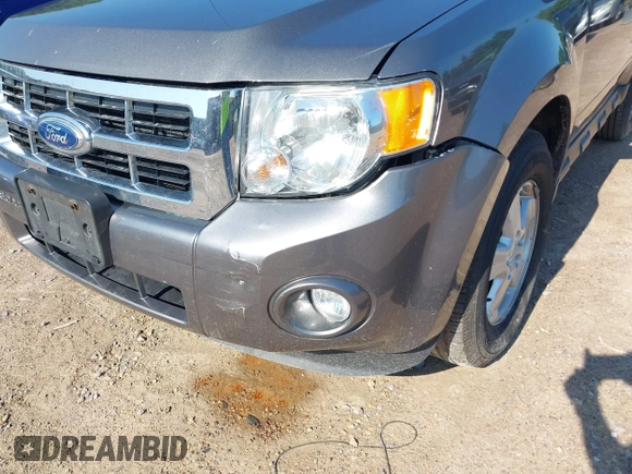 2012 Ford Escape XLT z VIN 1FMCU9DG7CKB28270, wystawiony jako IAAI lot #42607520 z przebiegiem 129 758 mil mil oraz . Historia ofert i sprzedaży dostępna na DreamBid. Obrazek 6.