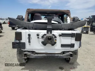 2013 Jeep Wrangler Unlimited Sport with VIN 1C4BJWDG8DL639781, listed as a Copart auction lot 63620025 with 84,720 mi miles and Salvage title. Bid and sale history available at DreamBid. Image 6.