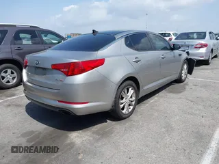 2013 Kia Optima EX z VIN 5XXGN4A70DG148060, wystawiony jako IAAI lot #41900134 z przebiegiem 149 214 mil mil oraz . Historia ofert i sprzedaży dostępna na DreamBid. Obrazek 4.