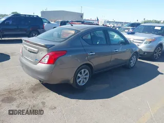2013 Nissan Versa S with VIN 3N1CN7AP8DL820857, listed as a IAAI auction lot 42690300 with 154,408 mi miles and . Bid and sale history available at DreamBid. Image 4.
