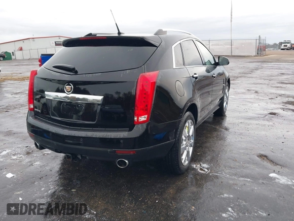 2011 Cadillac SRX Performance Collection with VIN 3GYFNBEYXBS597881, listed as a IAAI auction lot 41016643 with 164,781 mi miles and . Bid and sale history available at carsss.com. Image 4.