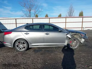 2013 Kia Optima SX w/Limited Pkg with VIN 5XXGR4A67DG191290, listed as a IAAI auction lot 41864684 with 136,525 mi miles. Bid and sale history available at carsss.com. Image 14.