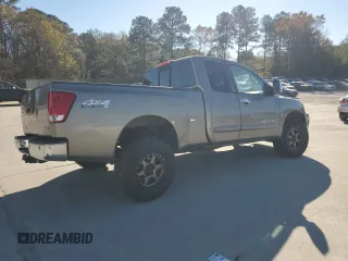 2006 Nissan Titan XE with VIN 1N6AA06B66N570734, listed as a Copart auction lot 83054724 with 205,702 mi miles and Salvage Title. Bid and sale history available at carsss.com. Image 3.