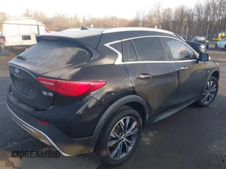 2018 Infiniti QX30 Luxury with VIN SJKCH5CR4JA046890, listed as a IAAI auction lot 41126484 with 92,165 mi miles and . Bid and sale history available at DreamBid. Image 4.