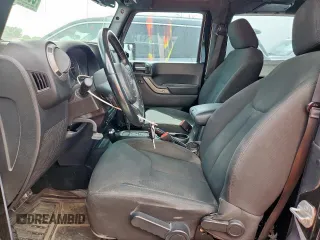 2016 Jeep Wrangler Black Bear with VIN 1C4AJWAG6GL332985, listed as a Copart auction lot 55244945 with 76,661 mi miles and Salvage title. Bid and sale history available at DreamBid. Image 7.
