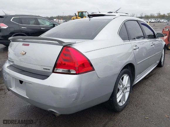 2015 Chevrolet Impala Limited LTZ with VIN 2G1WC5E33F1106563, listed as a IAAI auction lot 38069508 with 171,286 mi miles. Bid and sale history available at carsss.com. Image 4.