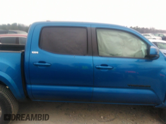 2018 Toyota Tacoma SR5 with VIN 3TMAZ5CN3JM066409, listed as a IAAI auction lot 41204775 with 75,000 mi miles and . Bid and sale history available at DreamBid. Image 13.