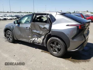 2023 Subaru Solterra Premium с VIN JTMABABA5PA027256, выставлен на аукционе Copart как лот 55825145 с пробегом 16 642 миль миль и На запчасти • Non repairable. История ставок и продаж доступна на DreamBid. Изображение 2.