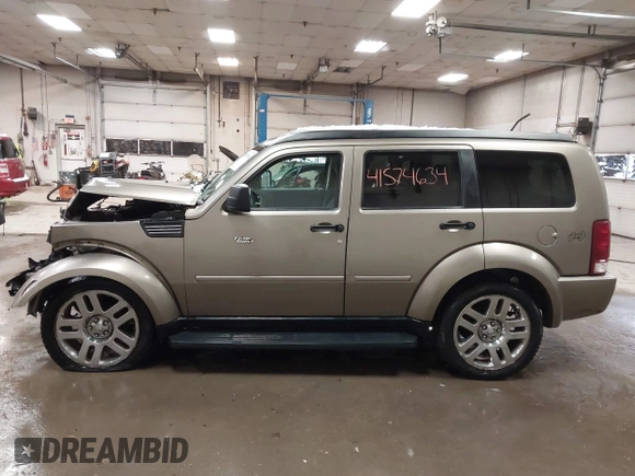 2007 Dodge Nitro SLT z VIN 1D8GU58K57W673543, wystawiony jako IAAI lot #41574634 z przebiegiem 64 286 mil mil oraz . Historia ofert i sprzedaży dostępna na DreamBid. Obrazek 15.
