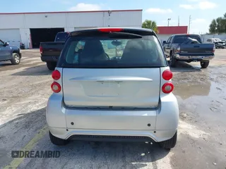 2012 Smart fortwo Pure z VIN WMEEJ3BA1CK560131, wystawiony jako IAAI lot #41540976 z przebiegiem 58 962 mil mil oraz . Historia ofert i sprzedaży dostępna na DreamBid. Obrazek 8.